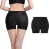 Rear view of a woman wearing black bodysuit shapewear, next to a smaller black shapewear garment.