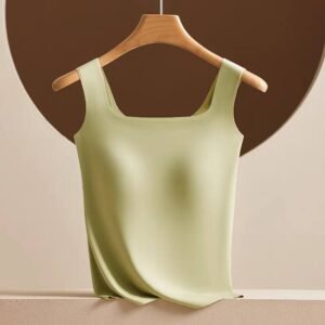 A light green sleeveless top displayed on a wooden hanger against a neutral background.