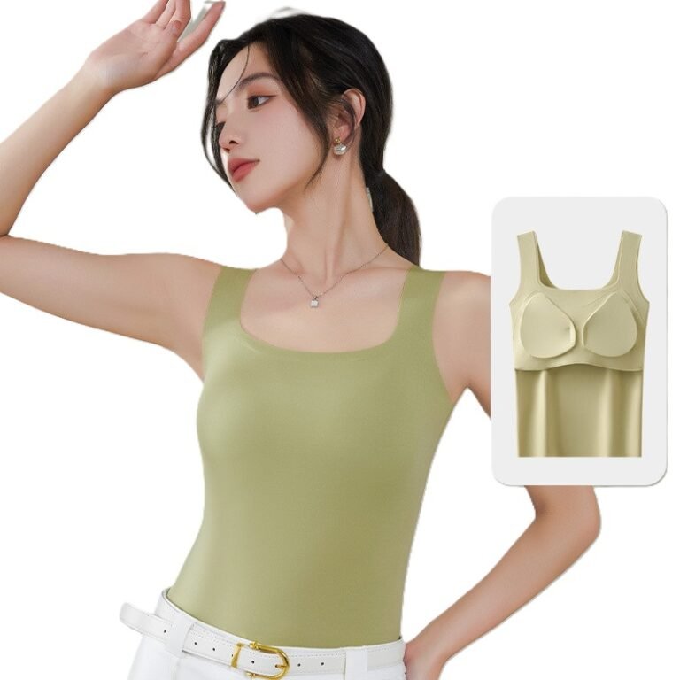 A woman in a light green tank top poses elegantly with her arm raised, showcasing a stylish outfit. A smaller image of the tank top design is displayed next to her.