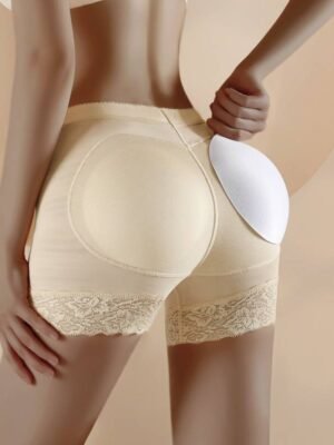 A model showcasing beige butt lifter shaper shorts with lace trim, emphasizing the backside and a padded insert.